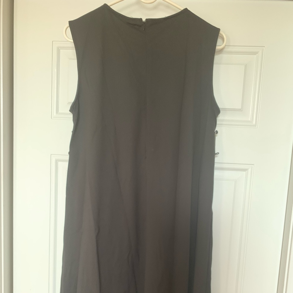Brand new large easy wear black dress.